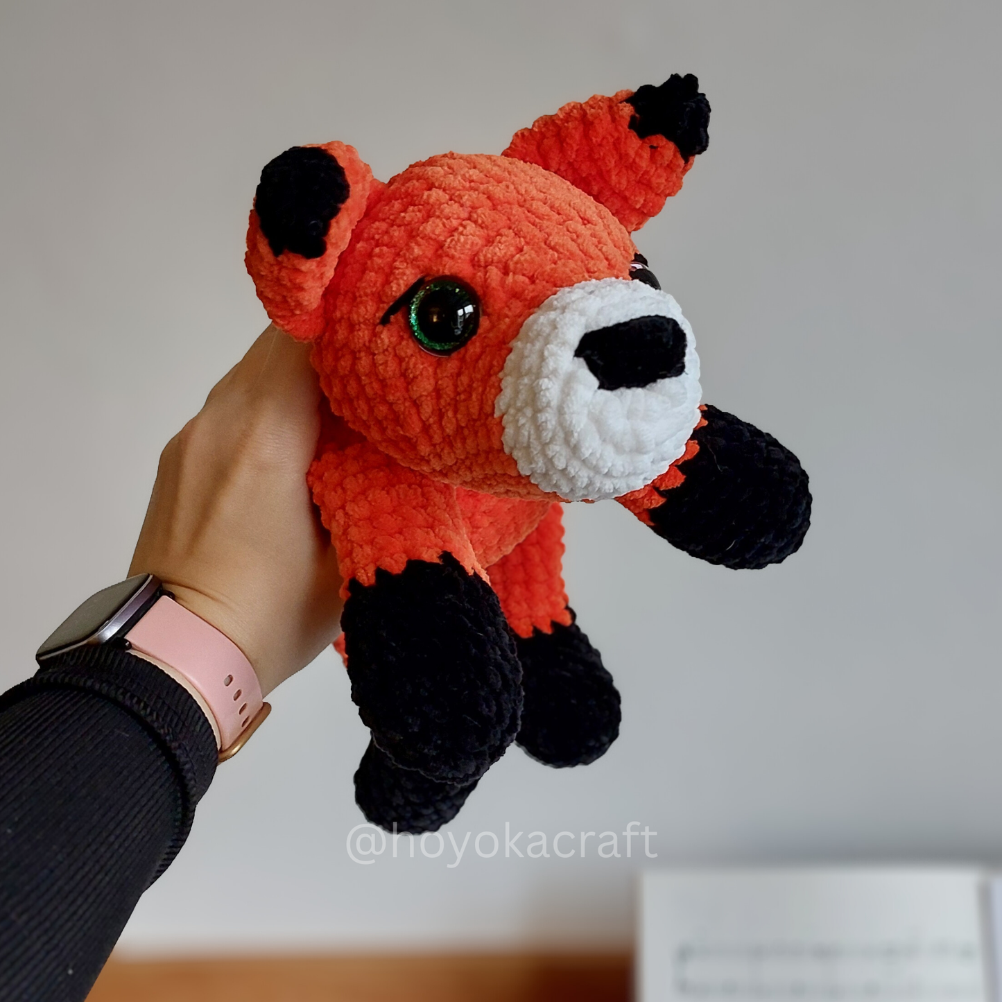 Fox lying down crochet plushie